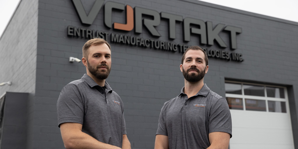 Chad and Chris Standing Infront of Vortakt Building